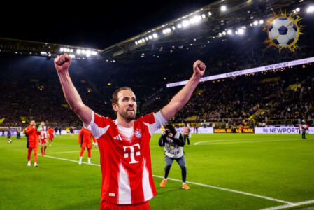 هاري كين يحتفل بهدفه في مرمى بوروسيا دورتموند في الدوري الألماني
